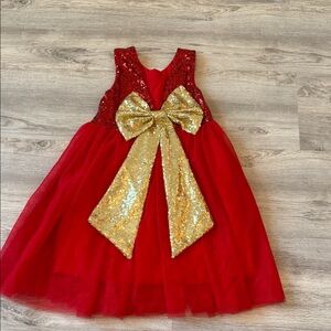 Elegant Red Sequin Kids Dress with Gold Bow in back. Size 4